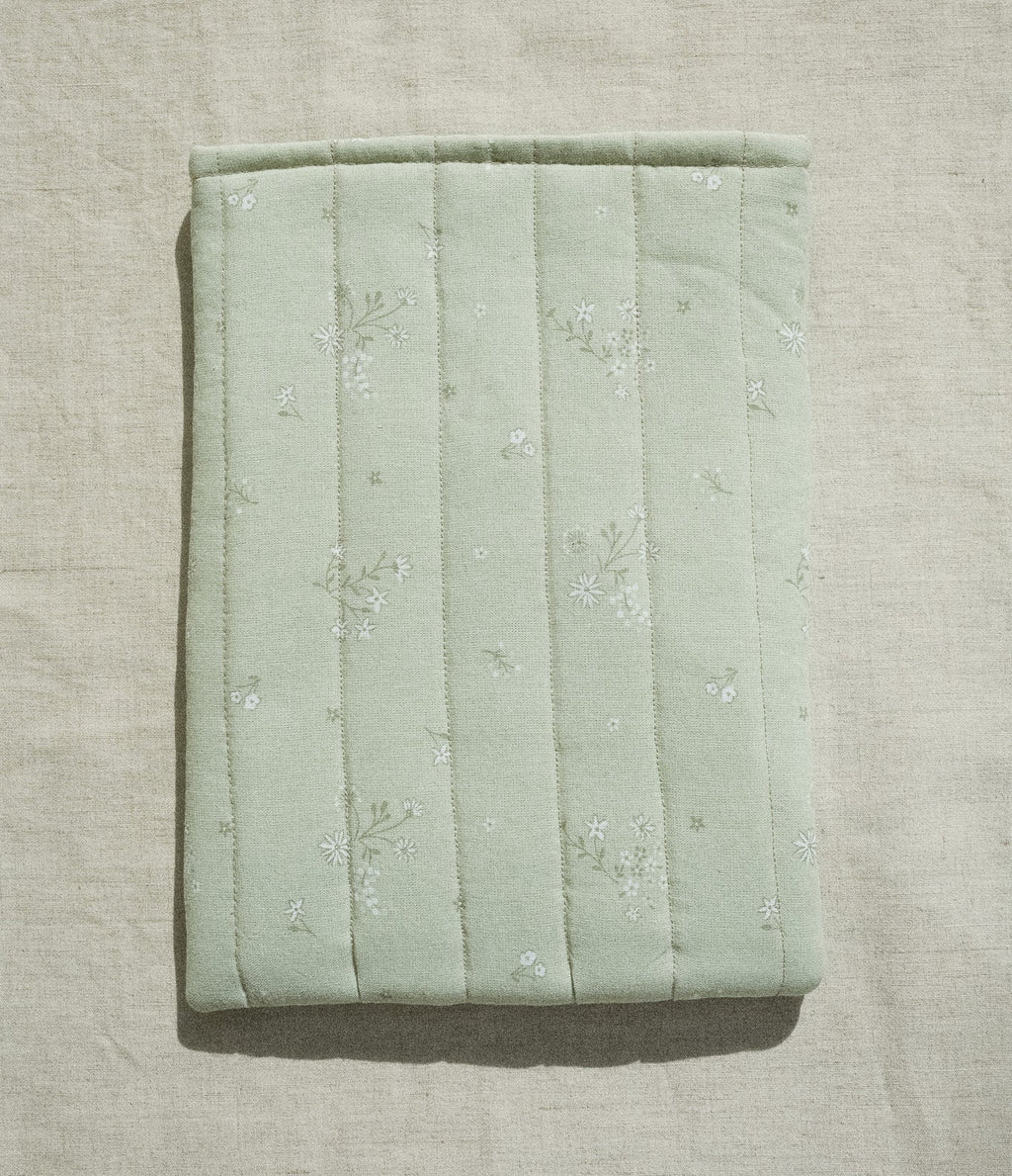 Sage booksleeve on linen background