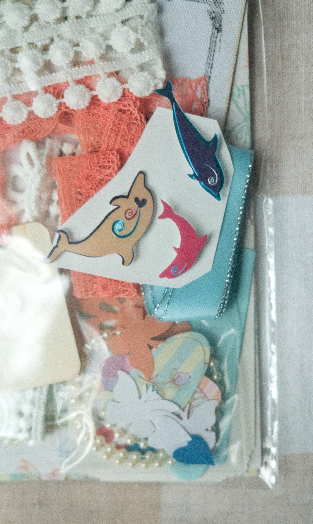 Packaged decorative items with cartoon characters on a textured surface