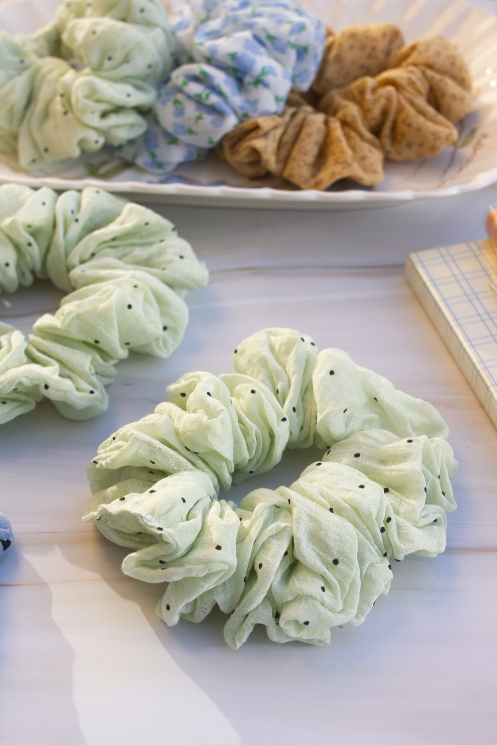 Green polka dot scrunchie