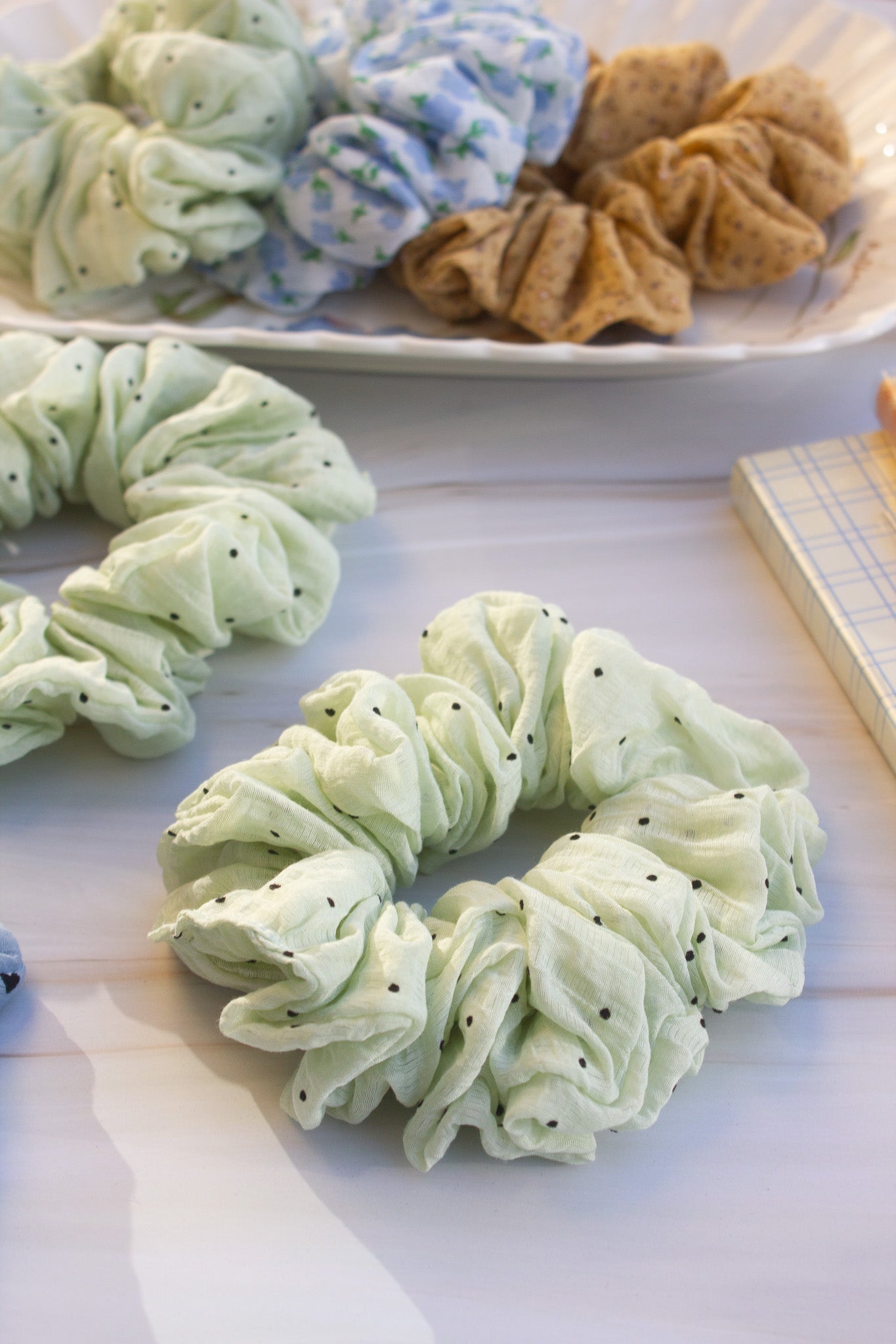 Green polka dot scrunchie